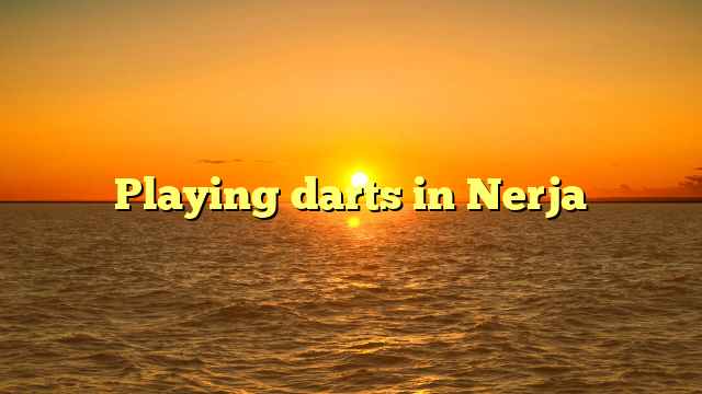 Playing darts in Nerja